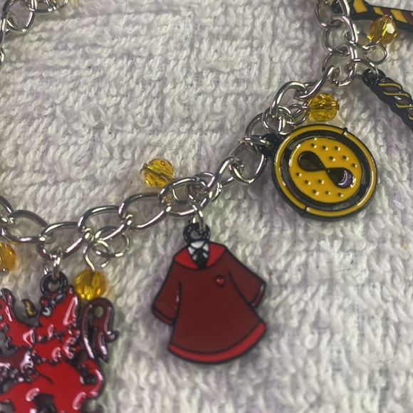 # 31 Charming Silver Bracelet with Red and Yellow Metal Charms - Picture 3 of 7